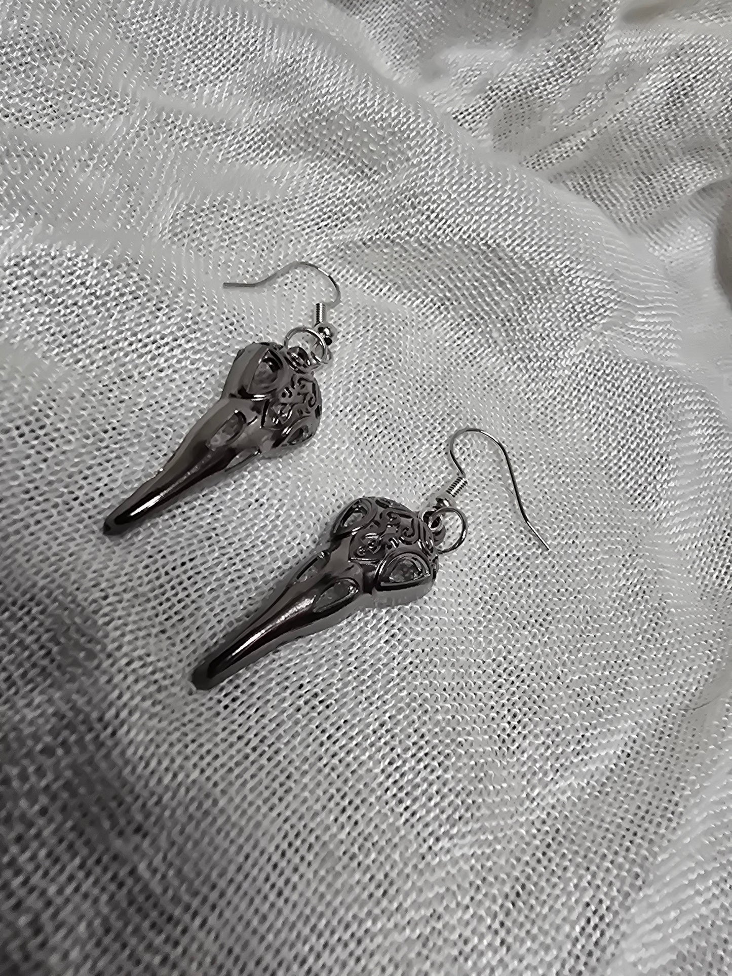 Death mask earrings