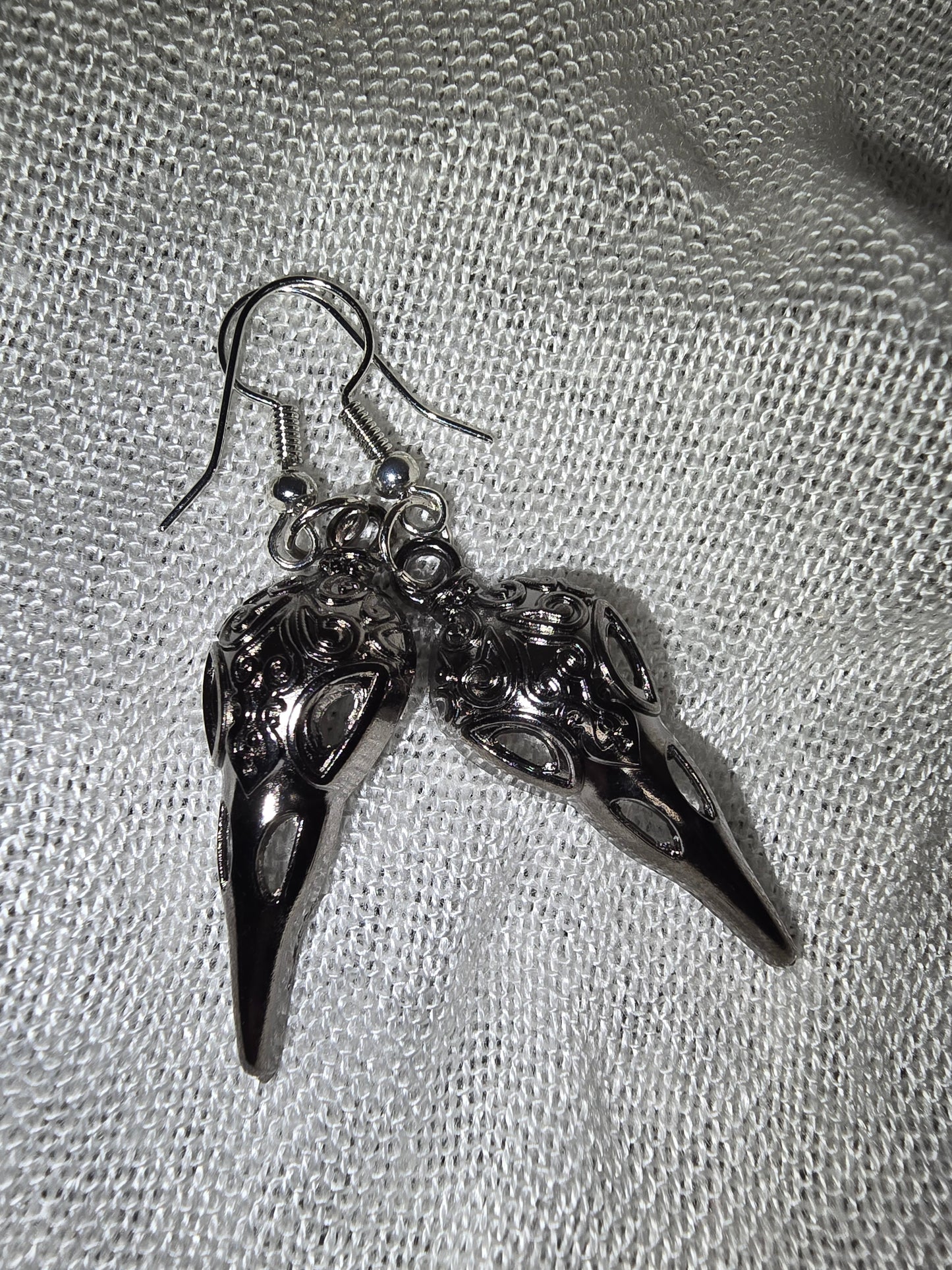 Death mask earrings