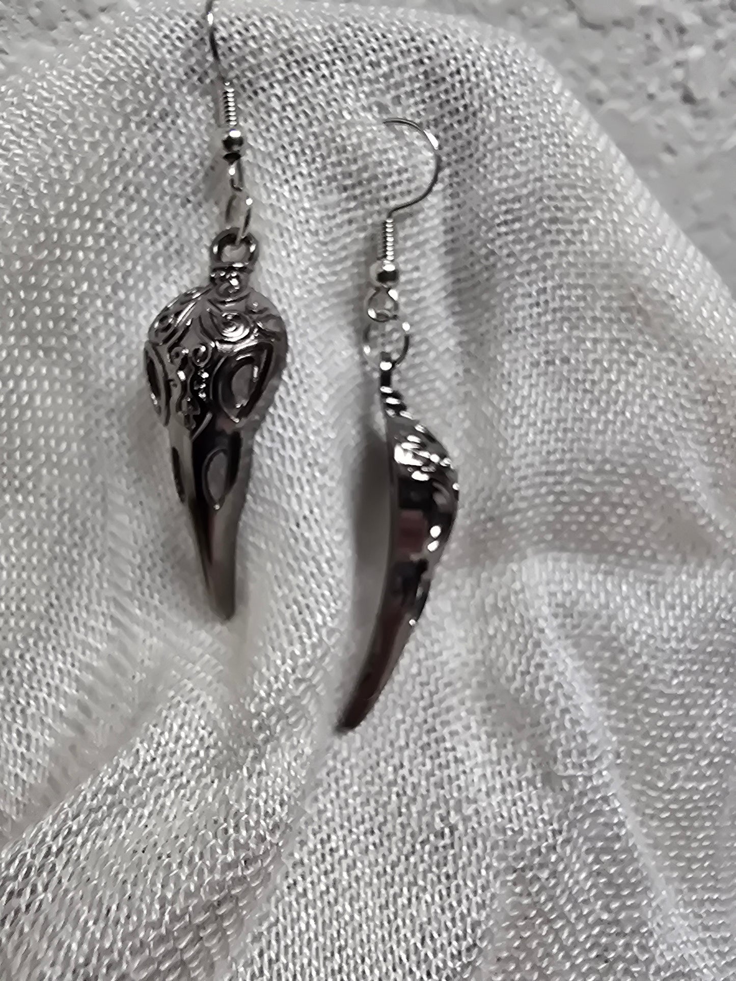 Death mask earrings