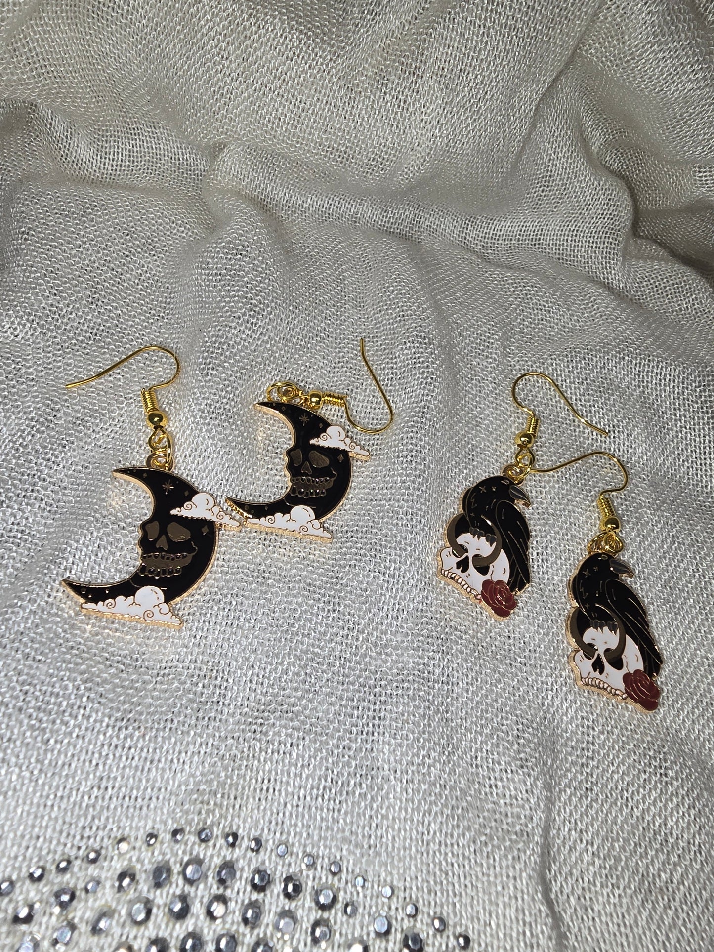 Raven and skull earrings