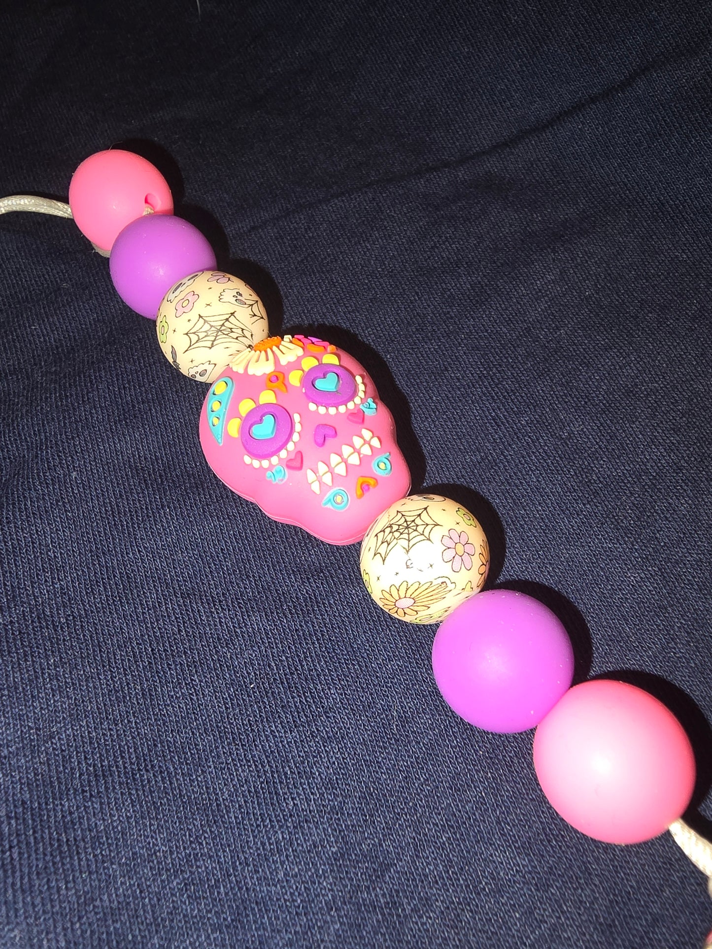 Sugar skull pacifier clip
