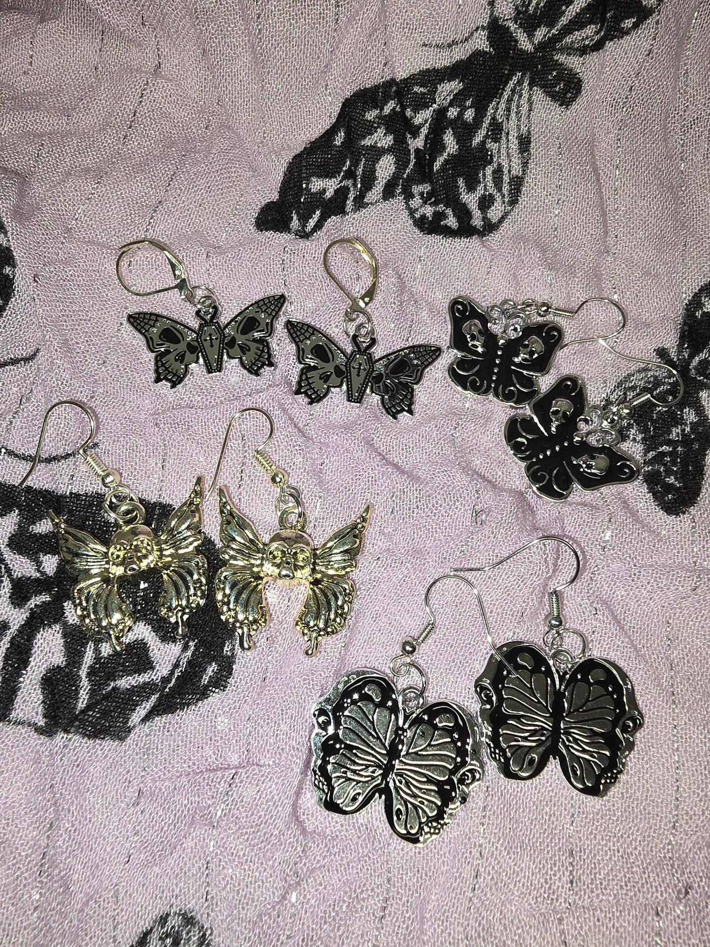 Butterfly skull earrings