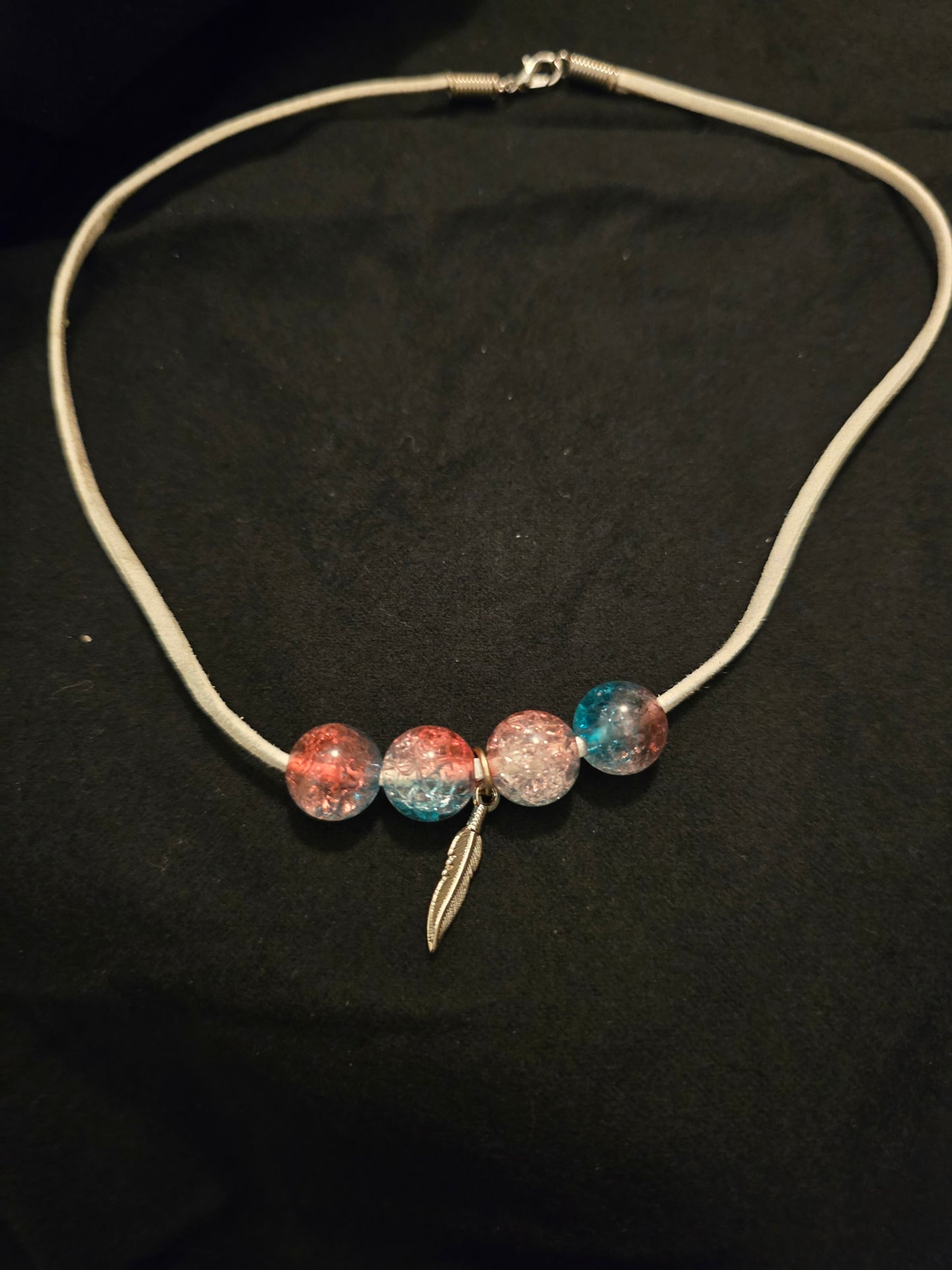 Crackle beads and feather