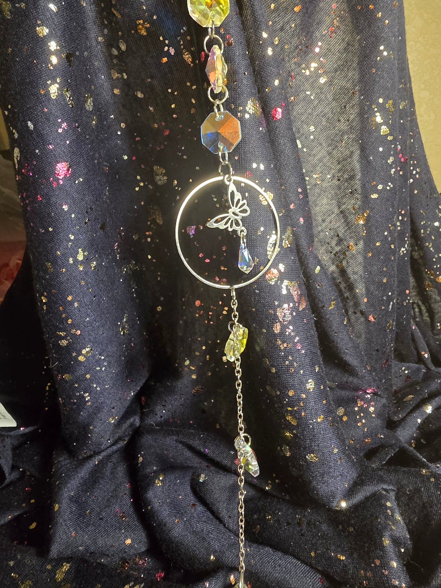 Flowers and butterfly suncatcher
