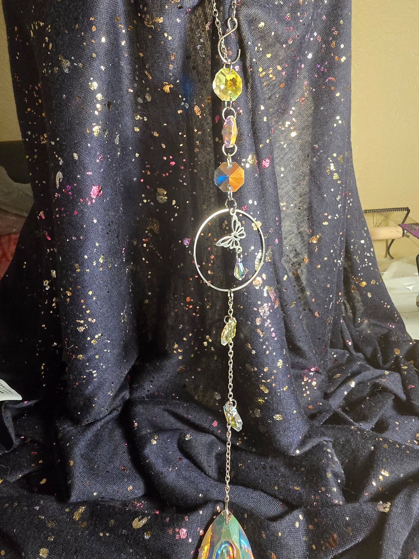 Flowers and butterfly suncatcher