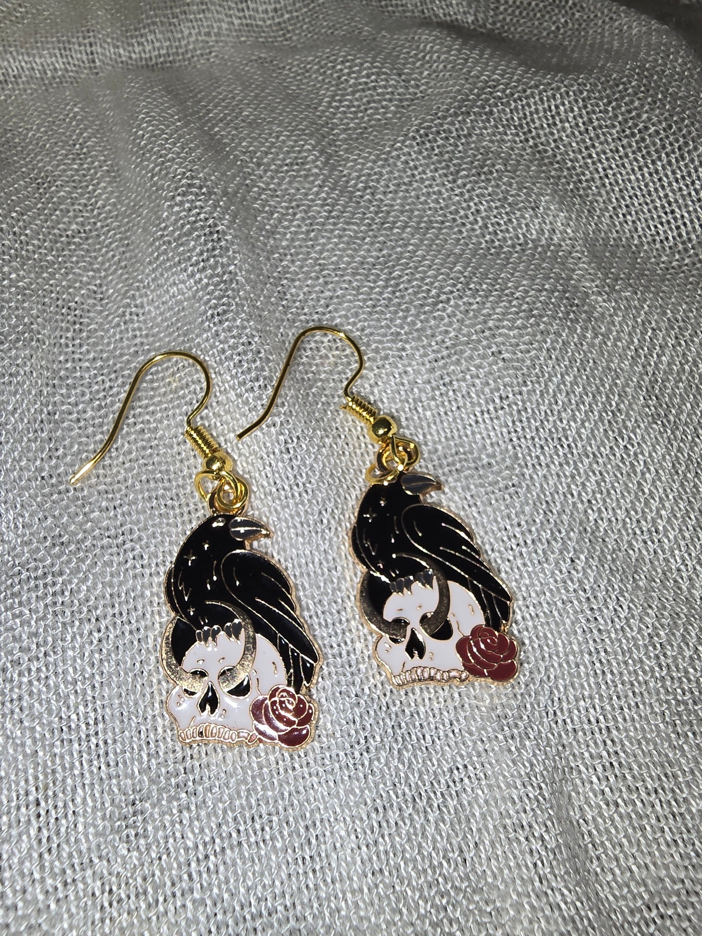 Raven and skull earrings