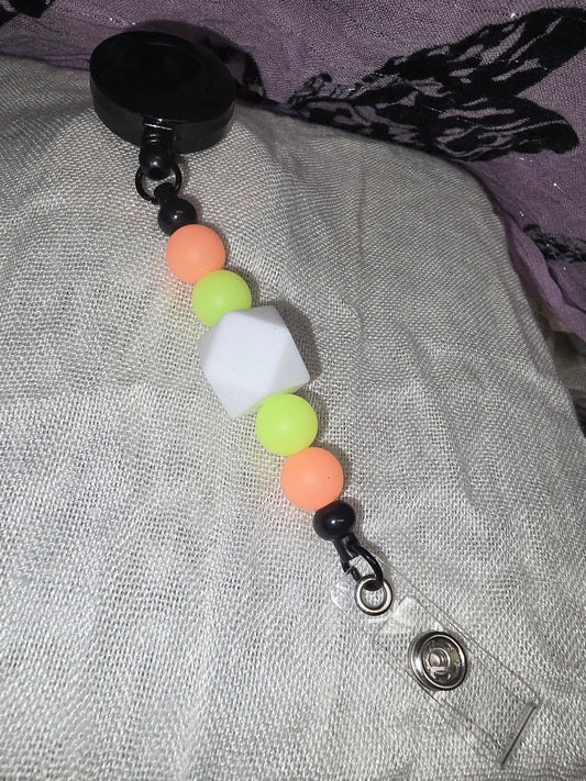 Glow in the dark badge reel