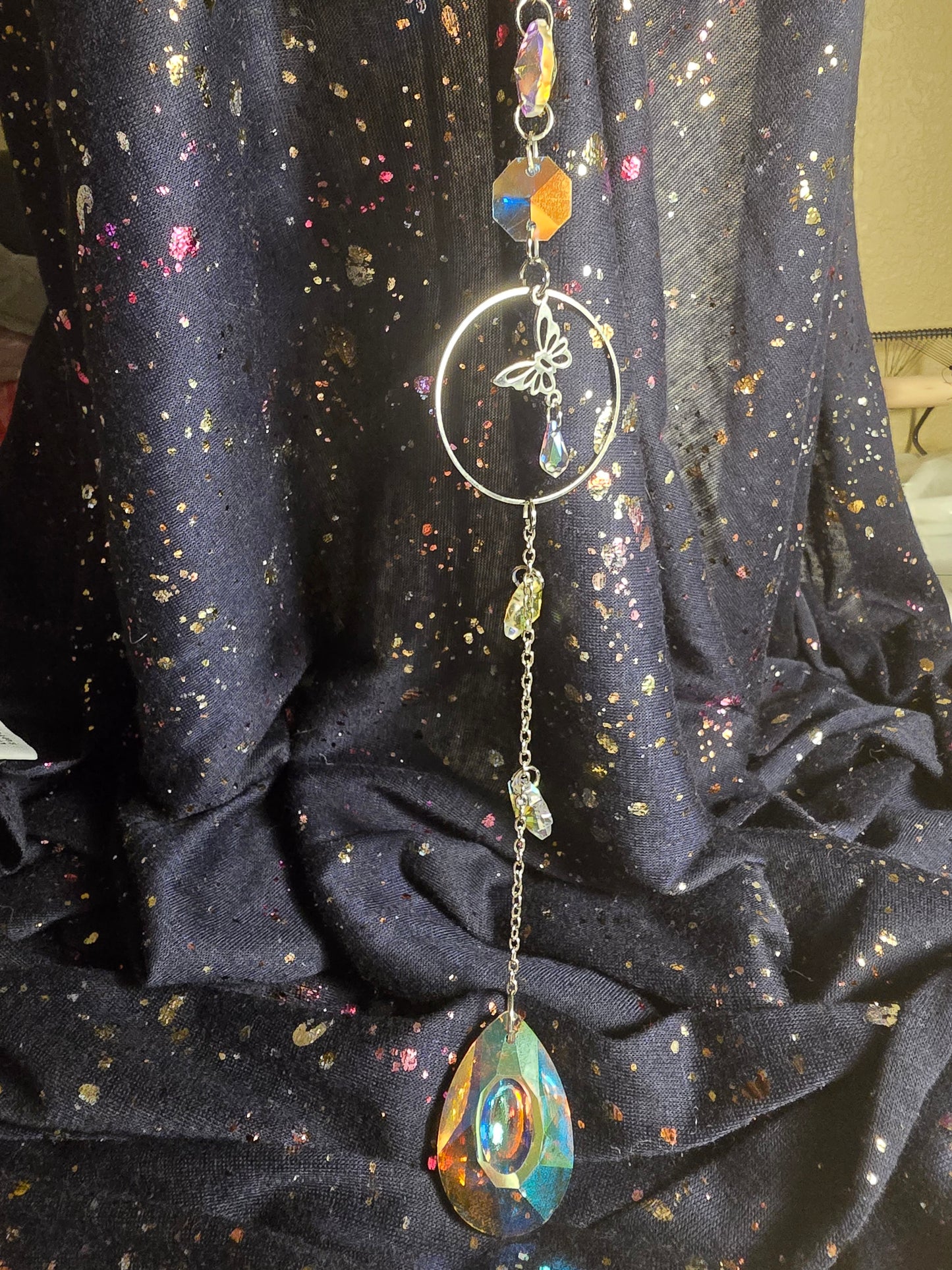 Flowers and butterfly suncatcher