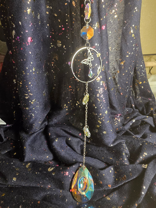Flowers and butterfly suncatcher