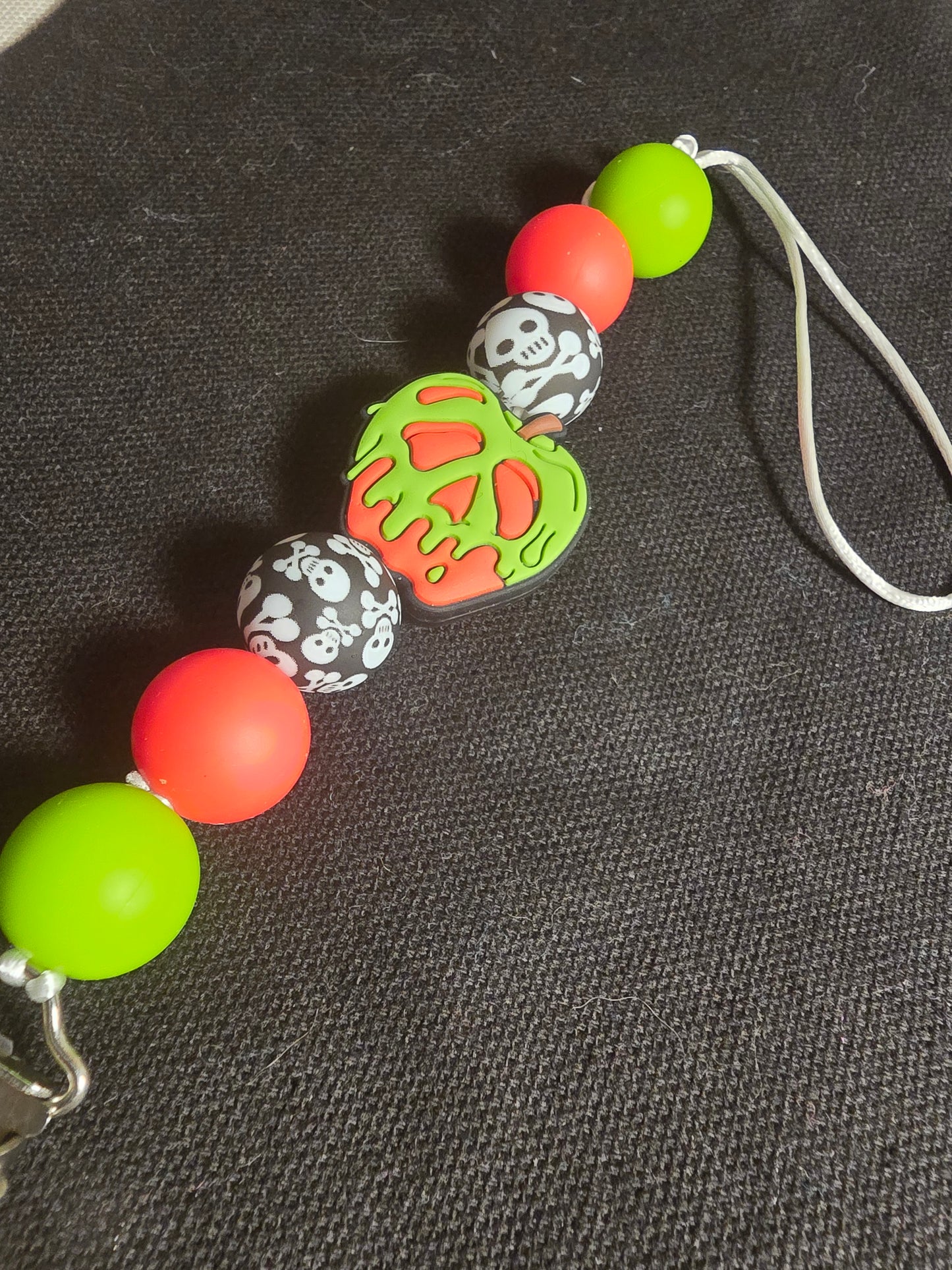 Poison apple pacifier clip