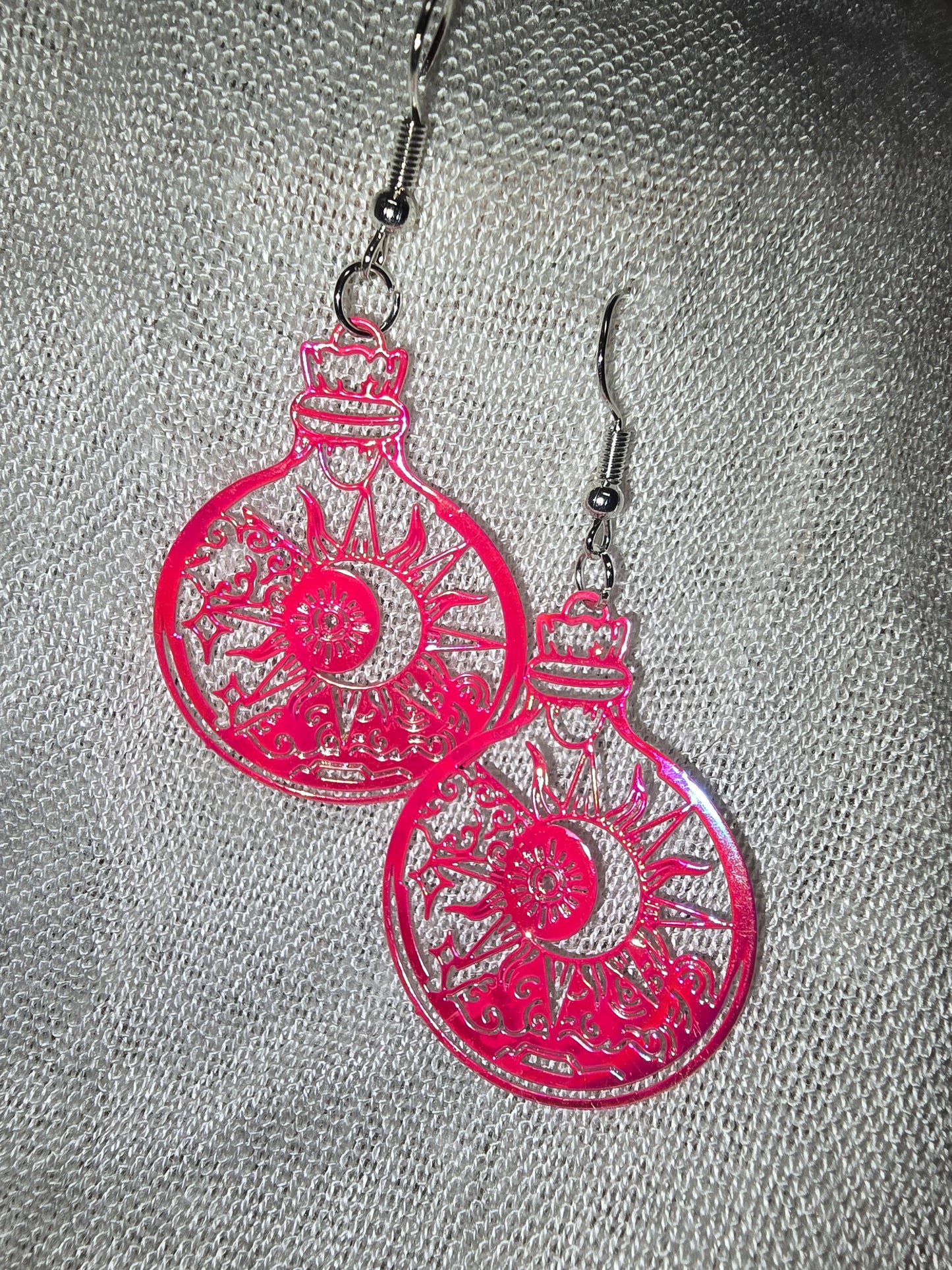 Sun potion bottle earrings